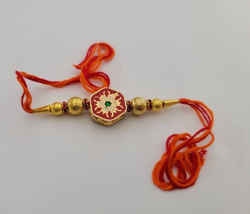 Beautiful rakhis with hanging charm, gold beads, iridescent blue acrylic beads |Indian rakhi| Lumba Rakshbandhan Rakhadi for brother