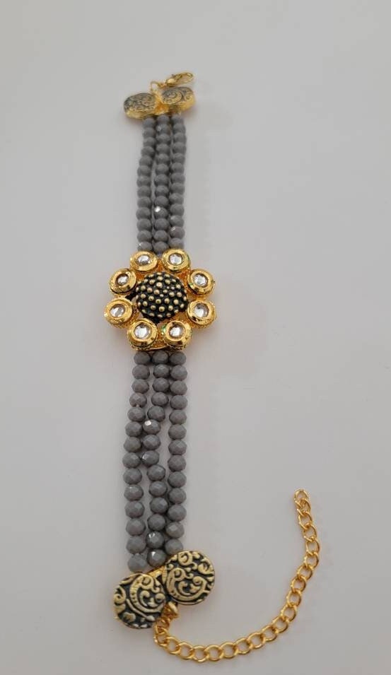 Beautiful rakhis with hanging charm, gold beads, iridescent blue acrylic beads |Indian rakhi| Lumba Rakshbandhan Rakhadi for brother