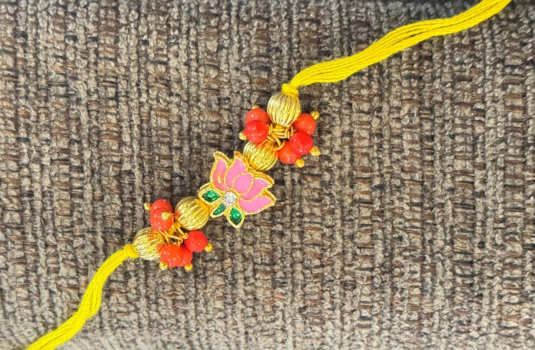 Beautiful rakhis with hanging charm, gold beads, pink and red lotus rakhi |Indian rakhi| Lumba Rakshbandhan Rakhadi for brother| Rakhdi